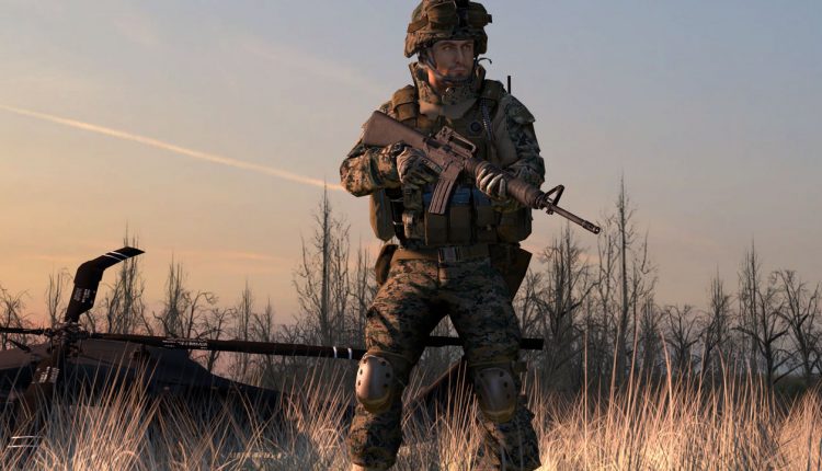 A man that is standing in the grass